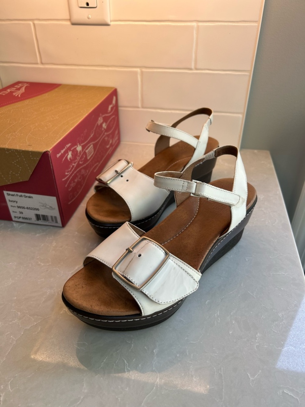 Dansko Ivory Buckle Wedge Sandals